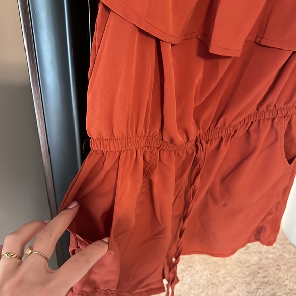 Burnt orange shorts romper . Can be work off shoulder size large - Picture 2 of 4